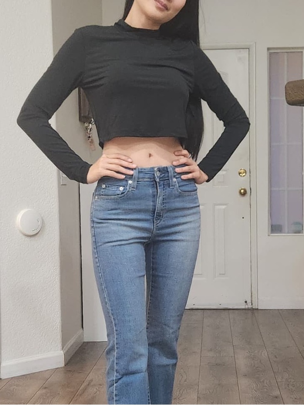 Black crop top with open back and gold chain